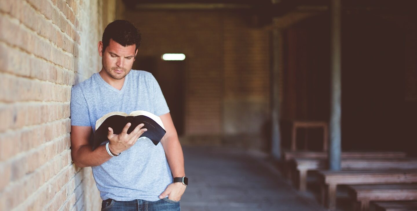 man reading book
